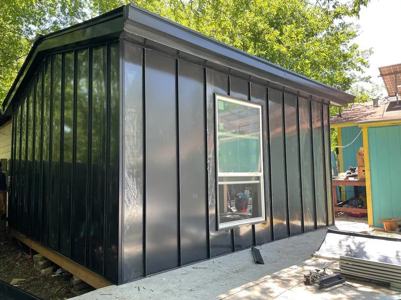 Black standing seam metal wall panels for Roof Inspection in Hondo