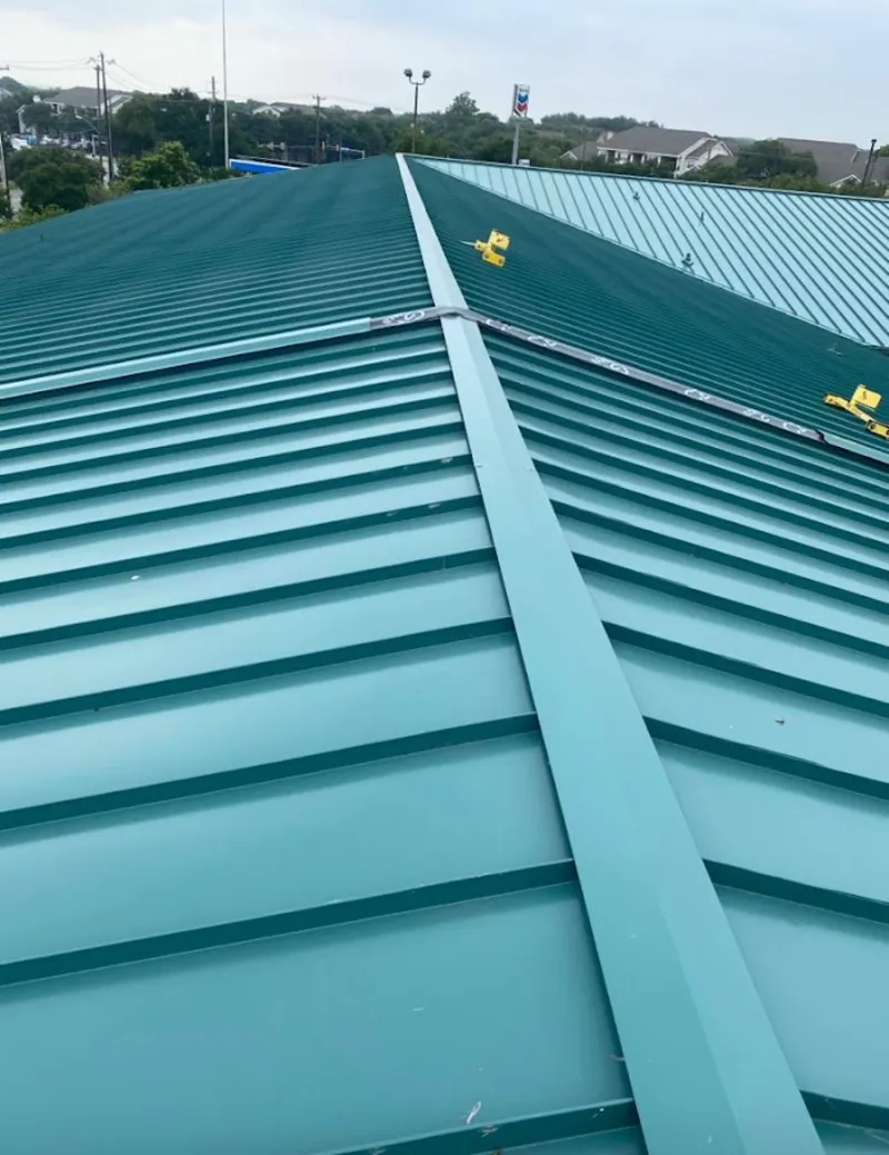 Green commercial metal roof ridge and valley for Metal Roof Repair in Hondo