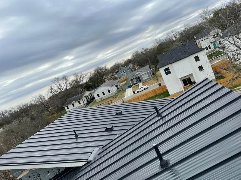 Standing seam metal roof panels with vents for Skylight Repair in Hondo